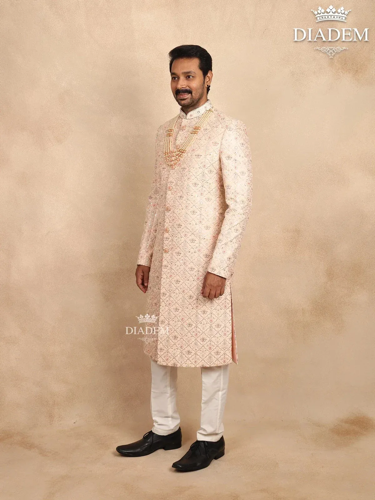 Cream Raw Silk Sherwani Suit with Floral Threadwork Embroidery, Paired with Bead Mala