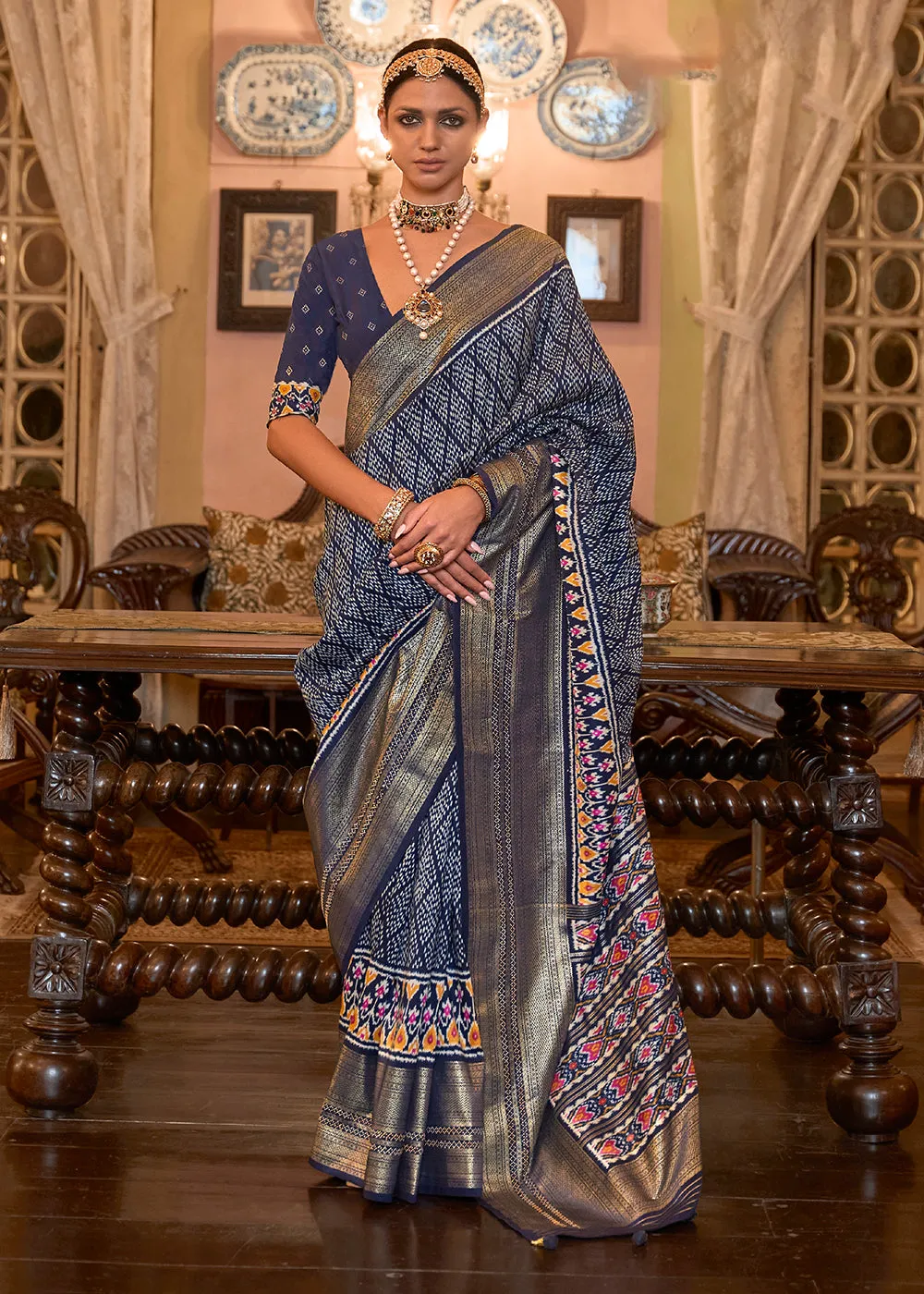 Remarkable Navy Blue Woven Zari & Printed Patola Silk Traditional Saree