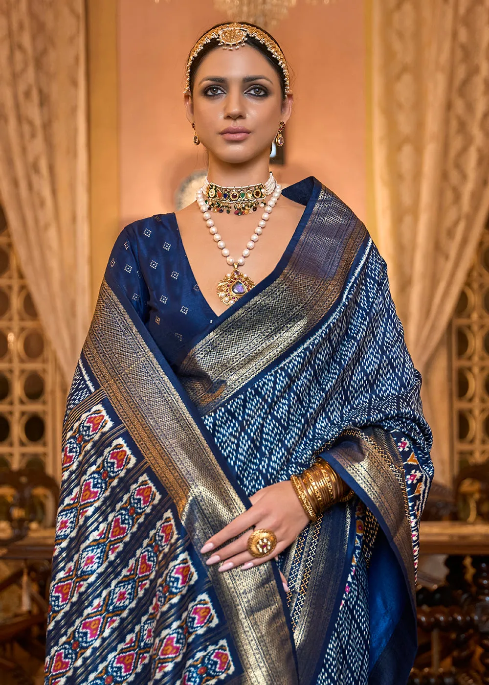 Remarkable Navy Blue Woven Zari & Printed Patola Silk Traditional Saree